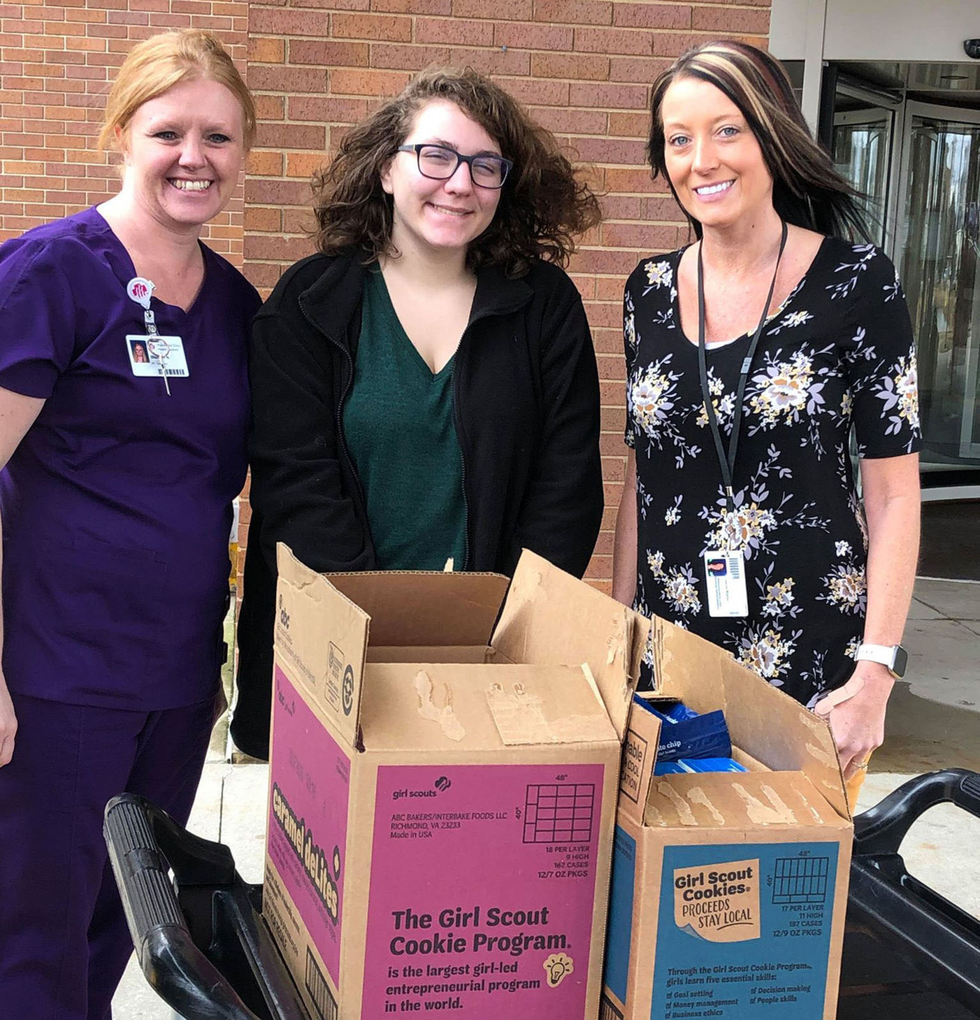 Girl scouts deliver cookies